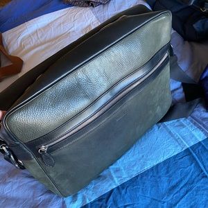 Dooney and Bourke men’s laptop/messenger bag.